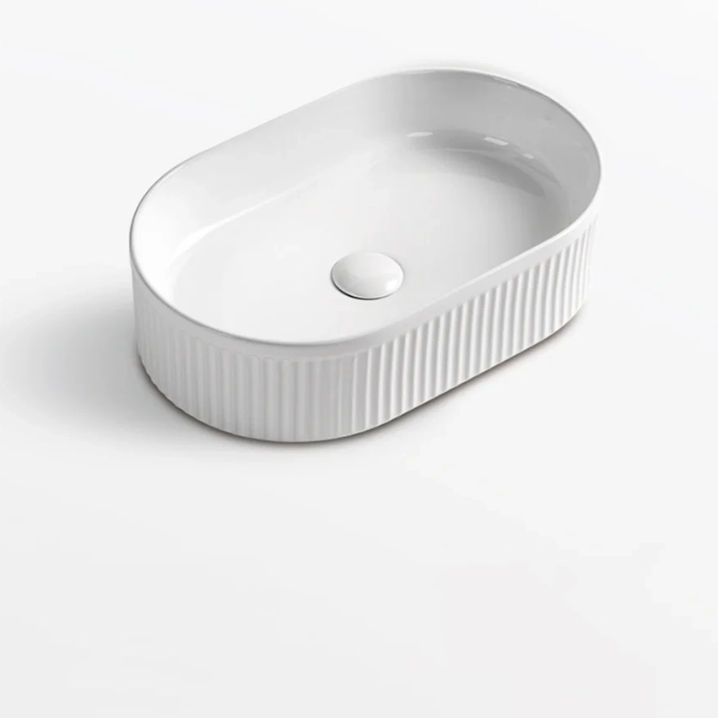 490 x 310 x 130mm Oval Matte White Fluted Above Counter Ceramic Basin